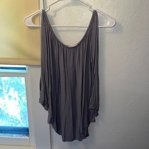 Lavender flowy shirt from "Don't Ask Why." Sleeves have cutouts